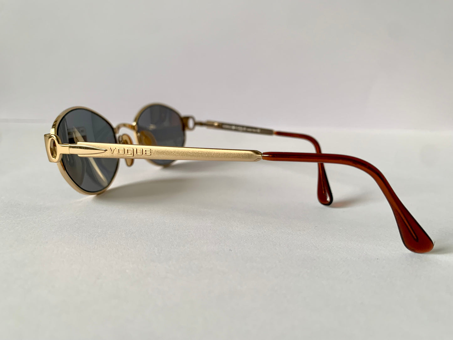 Vogue 90s vintage sunglasses - oval metal golden frames