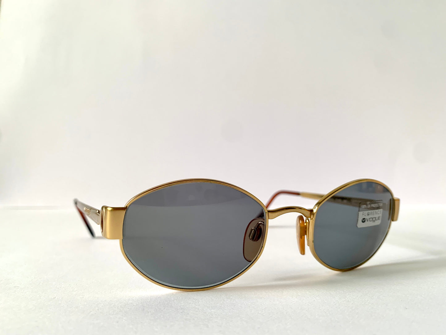 Vogue 90s vintage sunglasses - oval metal golden frames