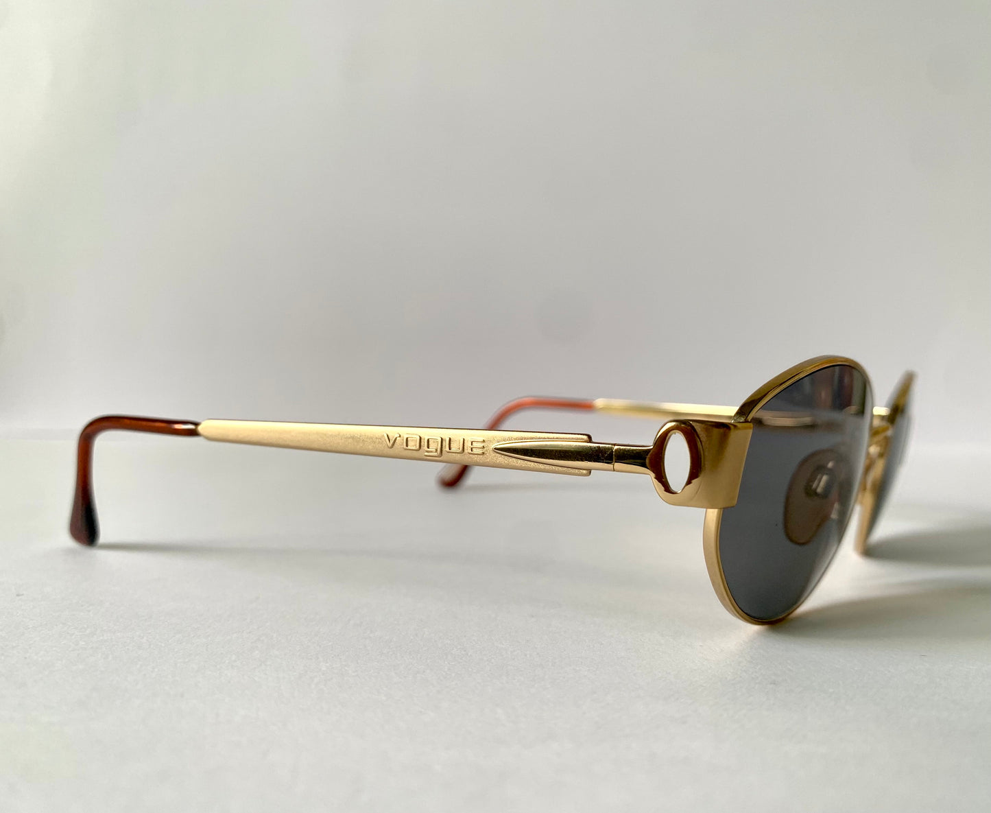 Vogue 90s vintage sunglasses - oval metal golden frames