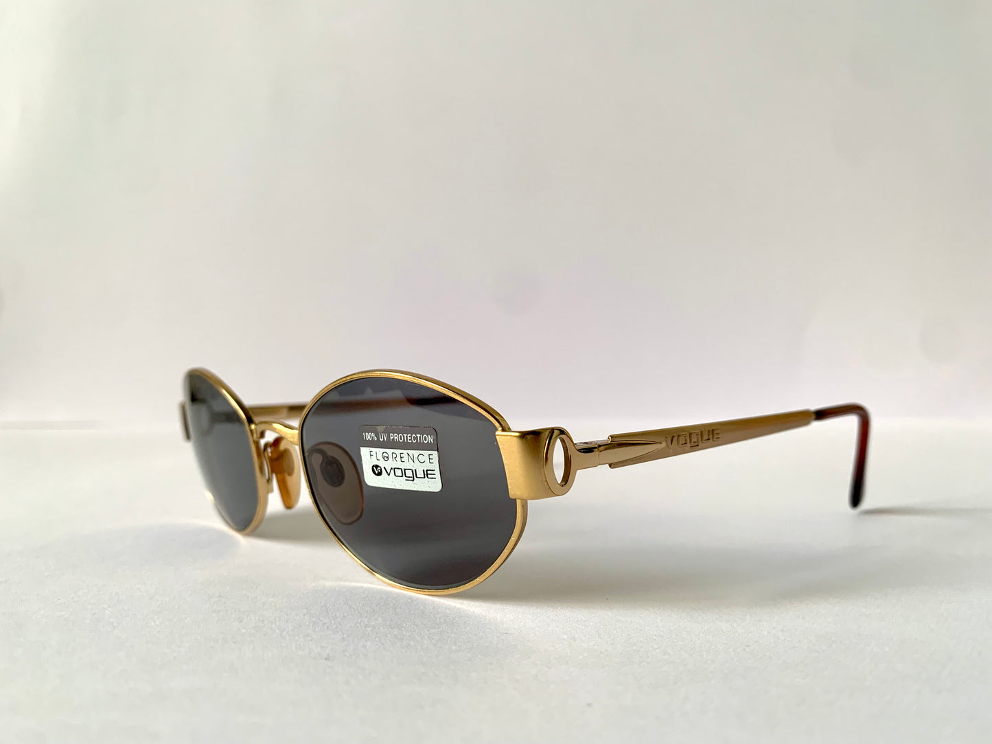 Vogue 90s vintage sunglasses - oval metal golden frames