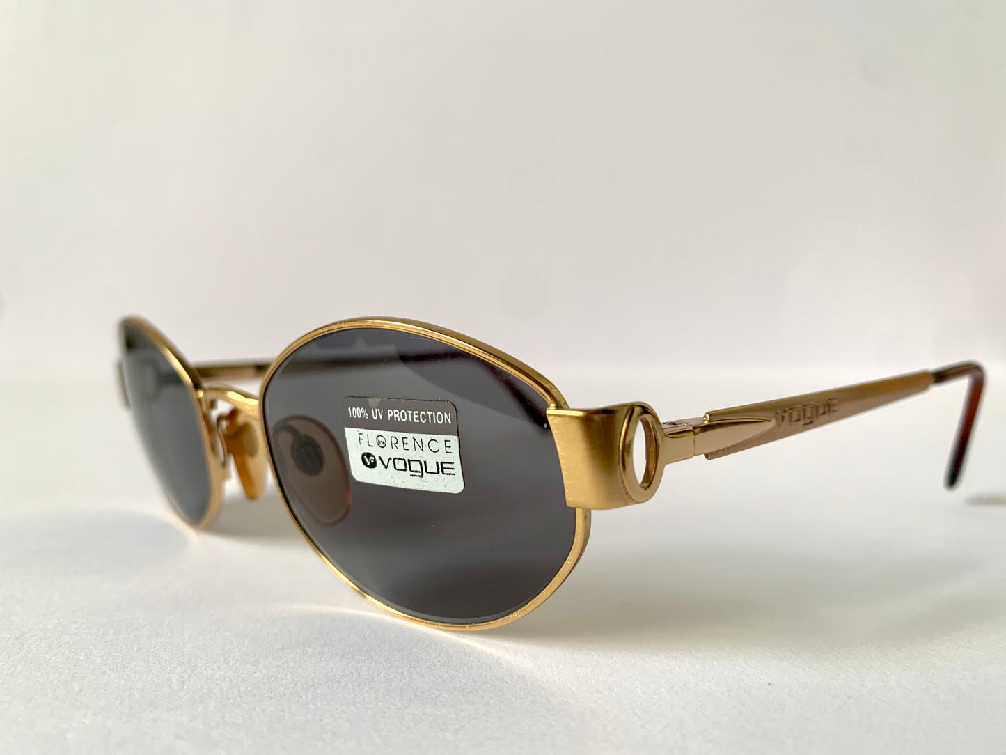 Vogue 90s vintage sunglasses - oval metal golden frames