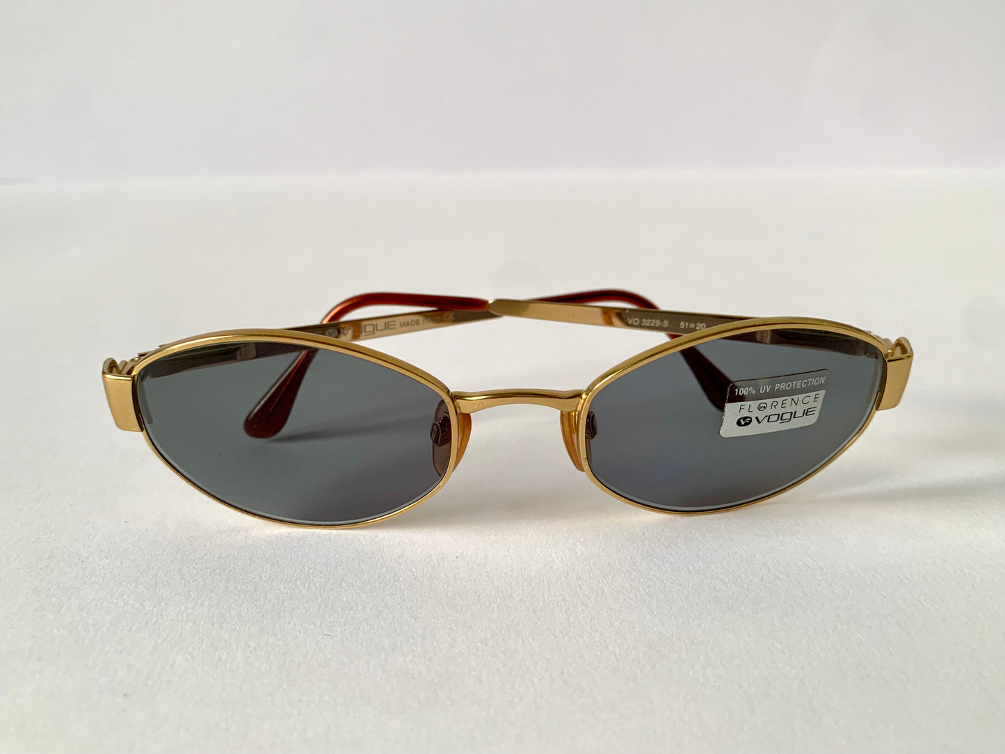 Vogue 90s vintage sunglasses - oval metal golden frames
