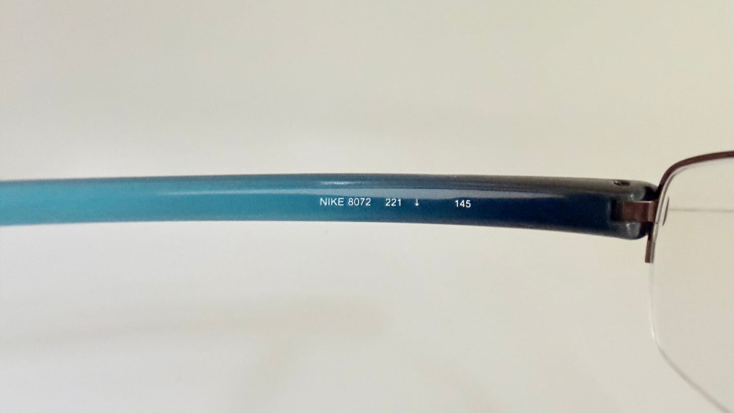 Vintage Nike 00s eyeglasses - Y2K rimless frame with black and blue temple