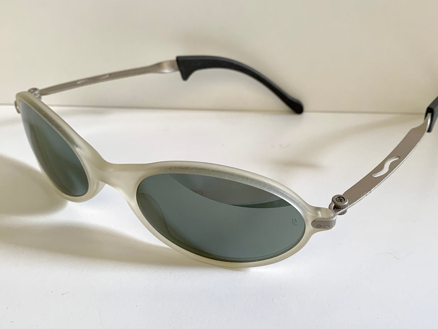 Ray Ban Orbs W2390 clear and silver sunglasses on a white background