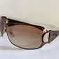 Gucci 90s vintage sunglasses - brown wrap frame with Strass Horsebit logo