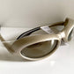 Vuarnet Extreme silver sunglasses with reflective lenses on a white background