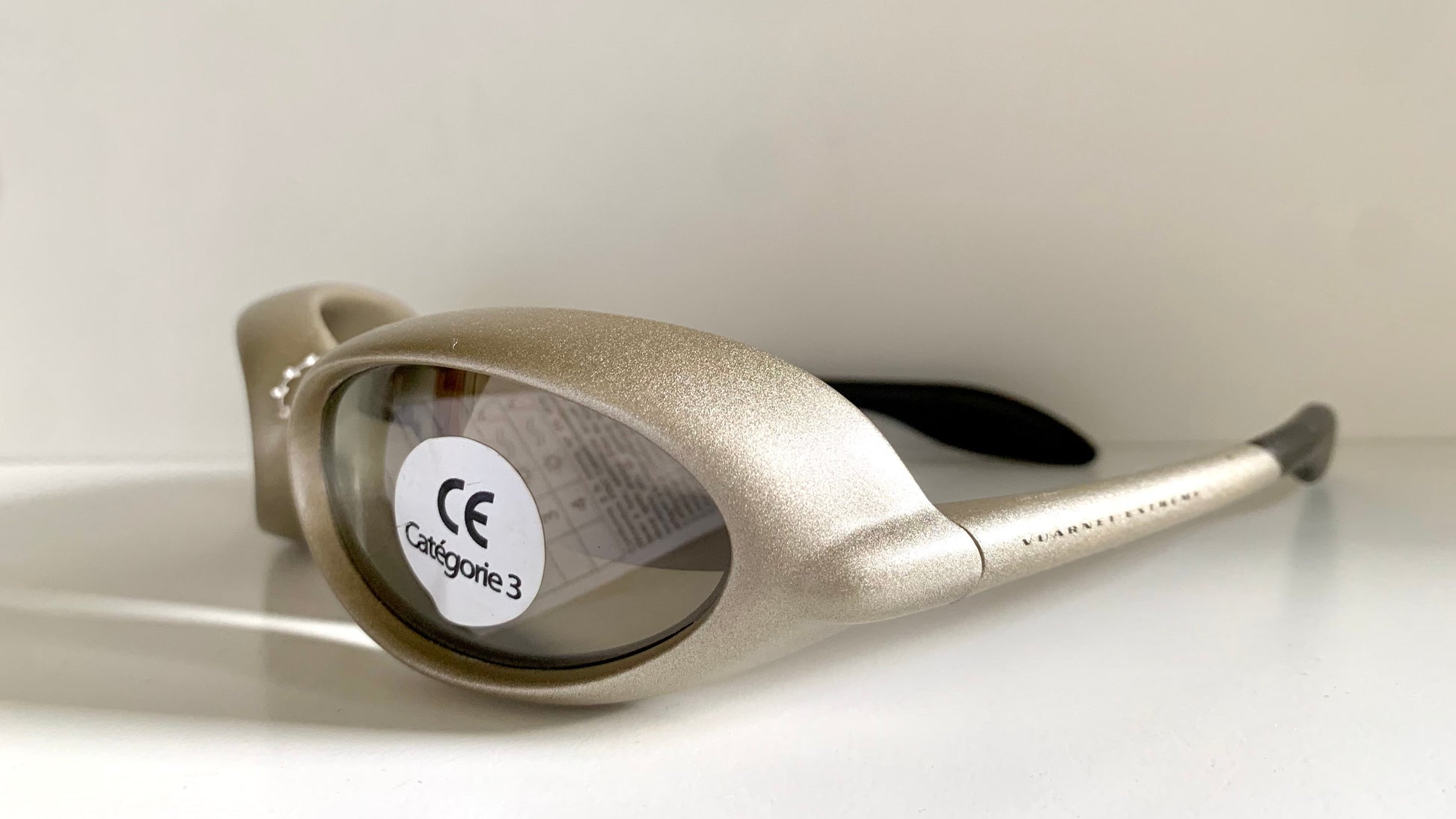 Vuarnet Extreme silver sunglasses with reflective lenses on a white background