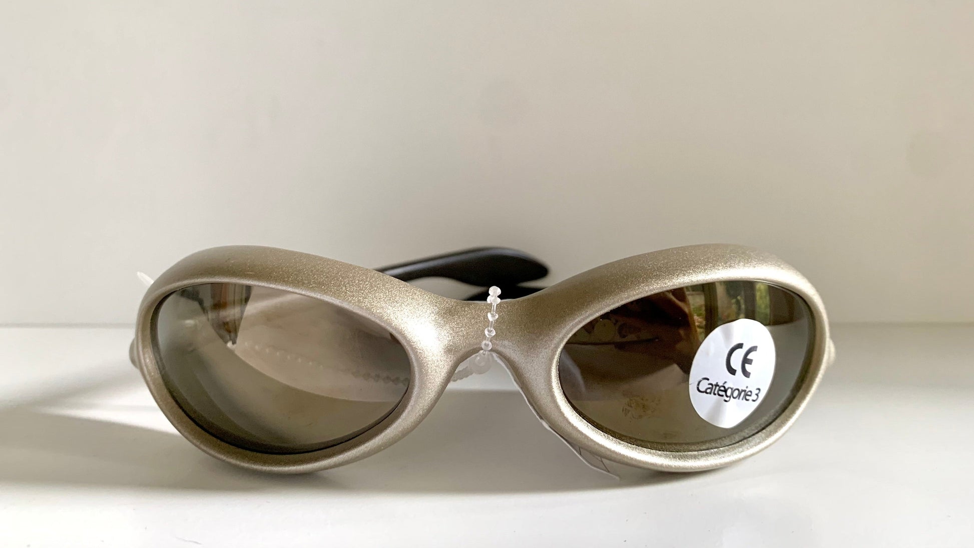 Vuarnet Extreme silver sunglasses with reflective lenses on a white background