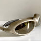 Vuarnet Extreme silver sunglasses with reflective lenses on a white background