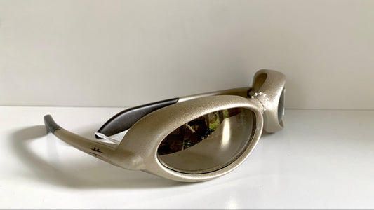 Vuarnet Extreme silver sunglasses with reflective lenses on a white background