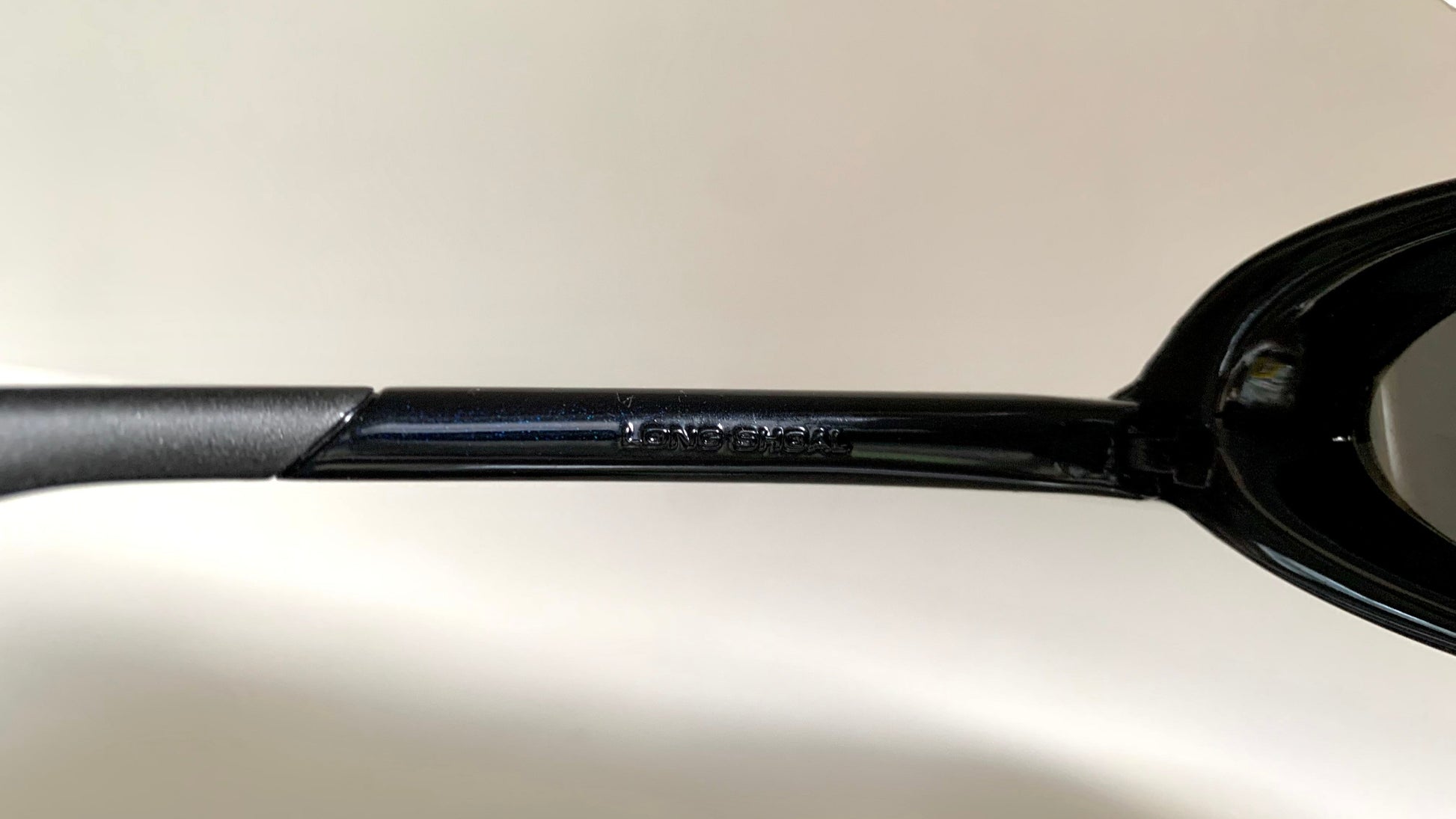 Vuarnet Extreme black sunglasses with a visible brand logo on a white background