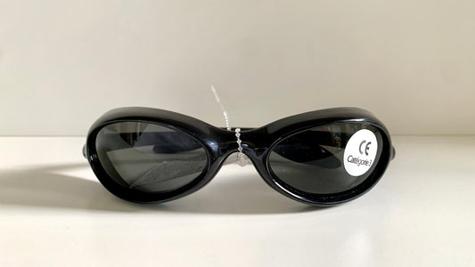 Vuarnet Extreme black sunglasses with a visible brand logo on a white background