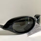 Vuarnet Extreme black sunglasses with a visible brand logo on a white background