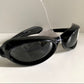 Vuarnet Extreme black sunglasses with a visible brand logo on a white background