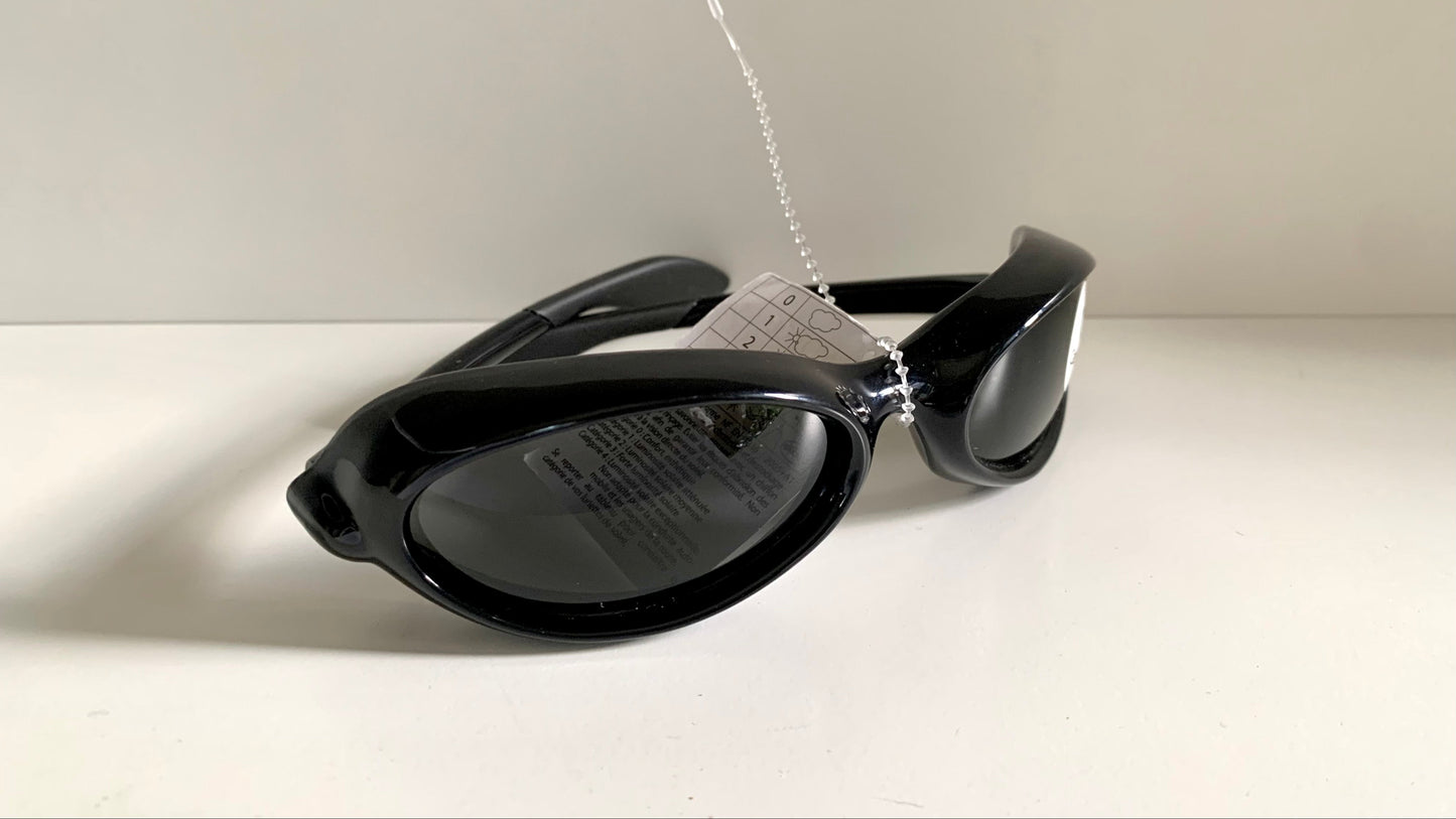 Vuarnet Extreme black sunglasses with a visible brand logo on a white background