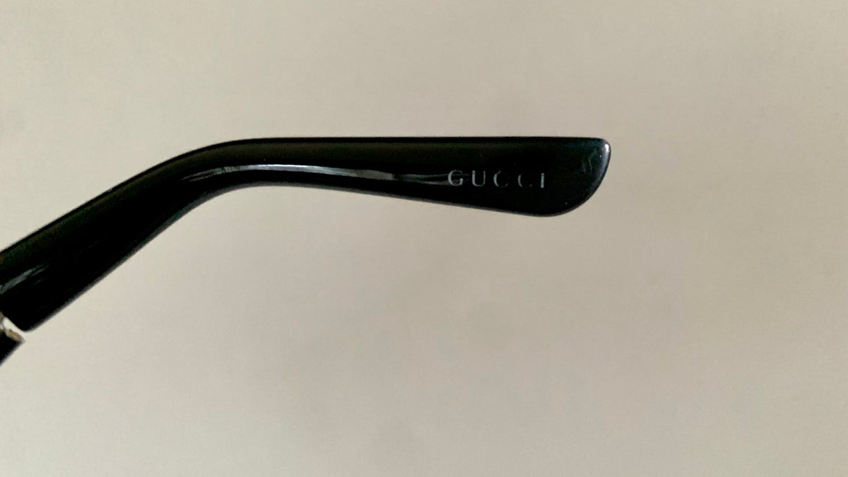 Gucci 00s vintage sunglasses - shield black and silver frame with Gucci logos