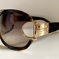 Gucci Vintage-Sonnenbrille aus den 90ern – brauner Wrap-Rahmen mit Strass-Horsebit-Logo