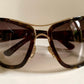 Gucci Vintage-Sonnenbrille aus den 90ern – brauner Wrap-Rahmen mit Strass-Horsebit-Logo