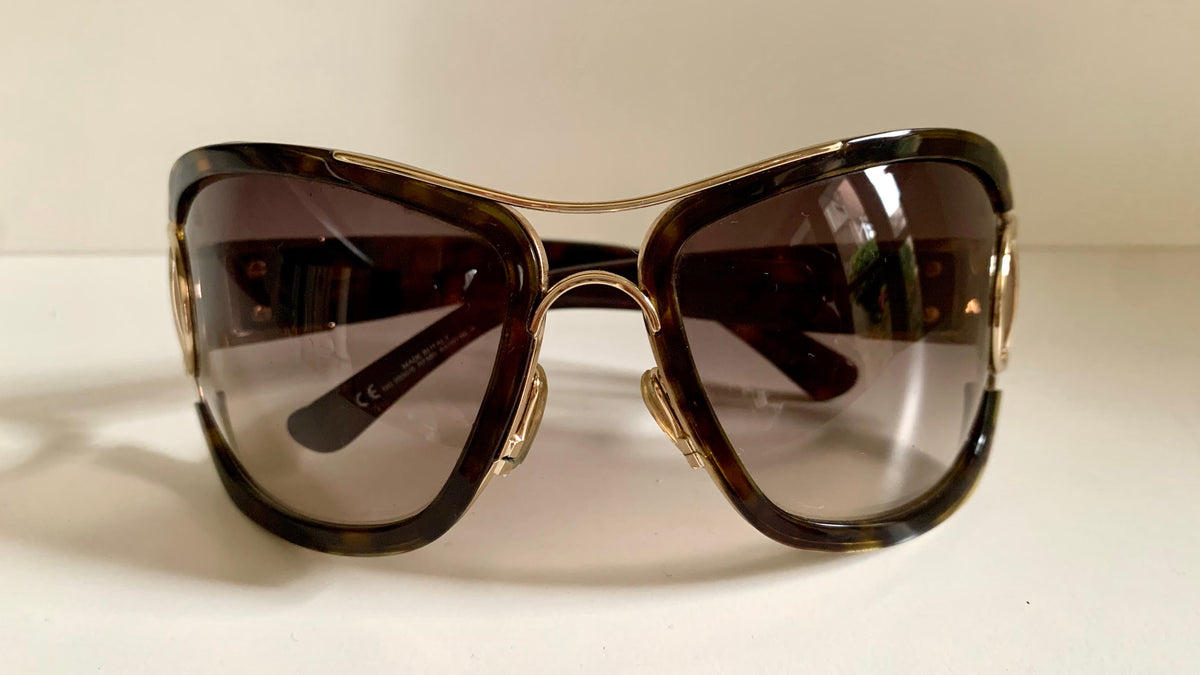 Gucci Vintage-Sonnenbrille aus den 90ern – brauner Wrap-Rahmen mit Strass-Horsebit-Logo