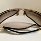 Gucci Vintage-Sonnenbrille aus den 90ern – brauner Wrap-Rahmen mit Strass-Horsebit-Logo