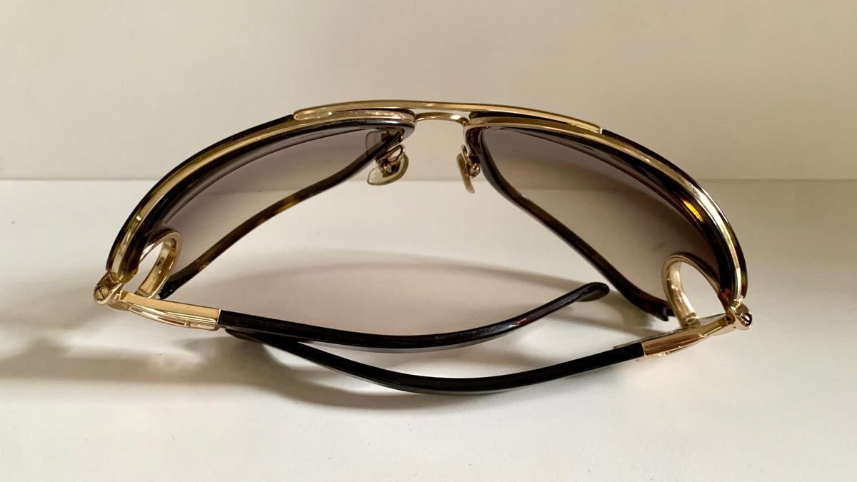 Gucci Vintage-Sonnenbrille aus den 90ern – brauner Wrap-Rahmen mit Strass-Horsebit-Logo