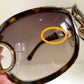 Gucci Vintage-Sonnenbrille aus den 90ern – brauner Wrap-Rahmen mit Strass-Horsebit-Logo