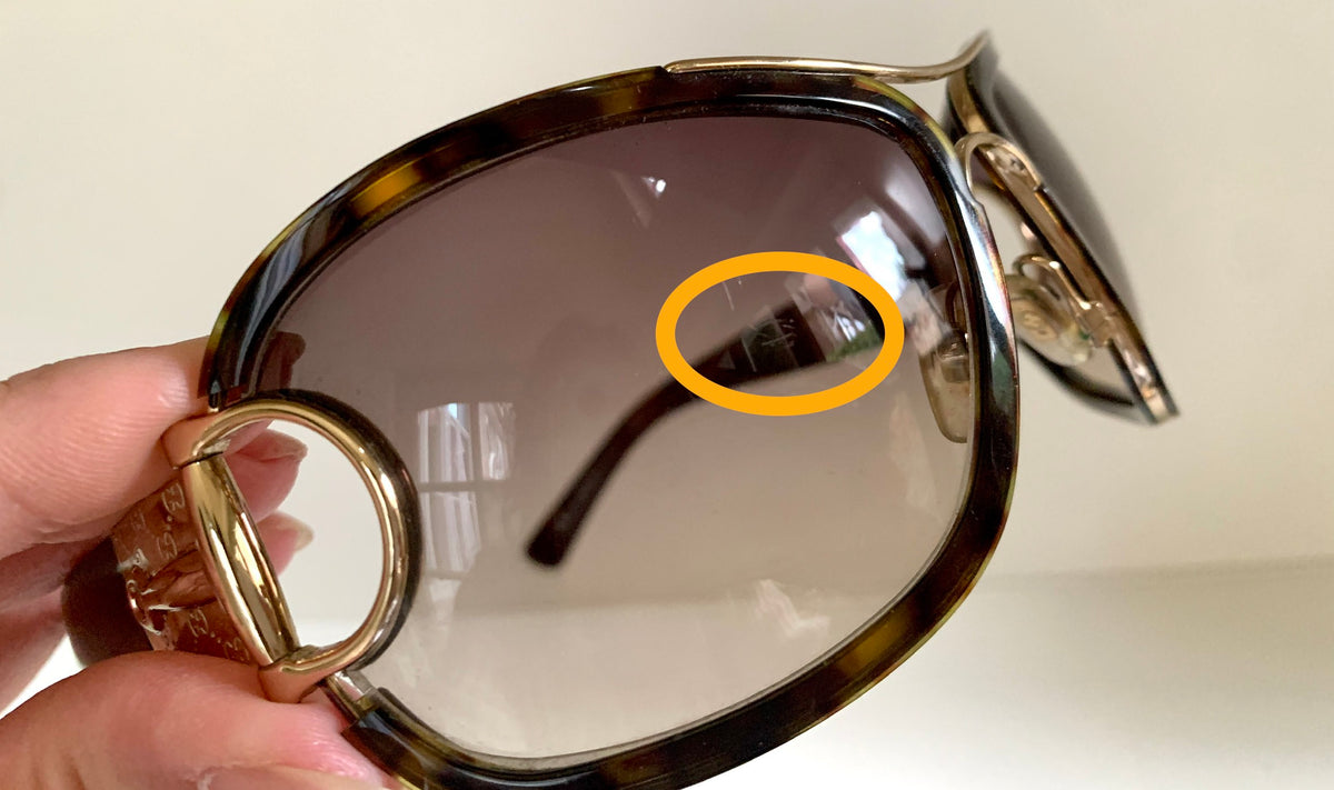 Gucci Vintage-Sonnenbrille aus den 90ern – brauner Wrap-Rahmen mit Strass-Horsebit-Logo