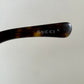 Gucci Vintage-Sonnenbrille aus den 90ern – brauner Wrap-Rahmen mit Strass-Horsebit-Logo