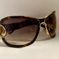 Gucci Vintage-Sonnenbrille aus den 90ern – brauner Wrap-Rahmen mit Strass-Horsebit-Logo