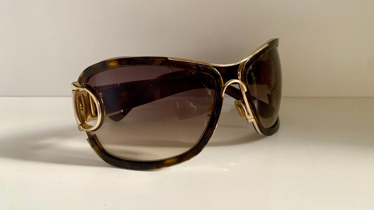 Gucci Vintage-Sonnenbrille aus den 90ern – brauner Wrap-Rahmen mit Strass-Horsebit-Logo