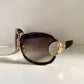 Gucci Vintage-Sonnenbrille aus den 90ern – brauner Wrap-Rahmen mit Strass-Horsebit-Logo