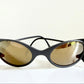 Vintage Bollé 90s sunglasses - wrap golden mirrored frames made in France