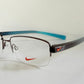 Vintage Nike 00s eyeglasses - Y2K rimless frame with black and blue temple