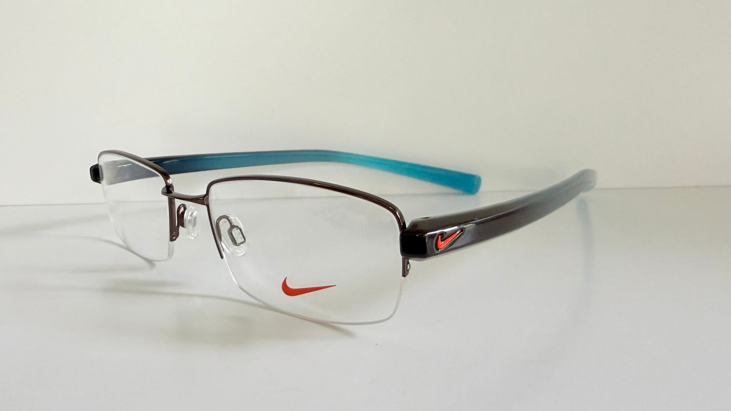Vintage Nike 00s eyeglasses - Y2K rimless frame with black and blue temple