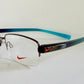 Vintage Nike 00s eyeglasses - Y2K rimless frame with black and blue temple