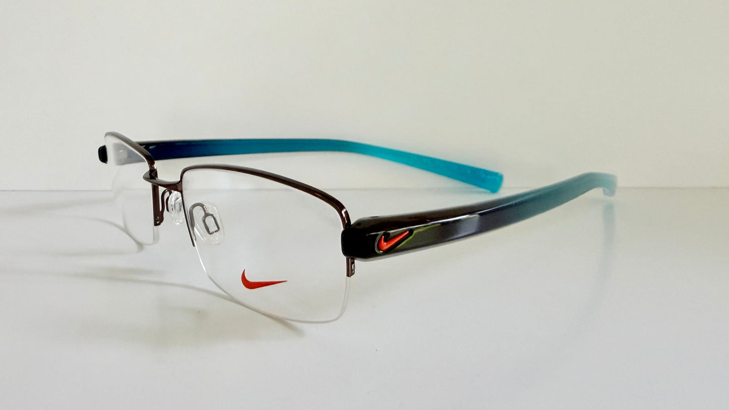 Vintage Nike 00s eyeglasses - Y2K rimless frame with black and blue temple