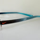 Vintage Nike 00s eyeglasses - Y2K rimless frame with black and blue temple
