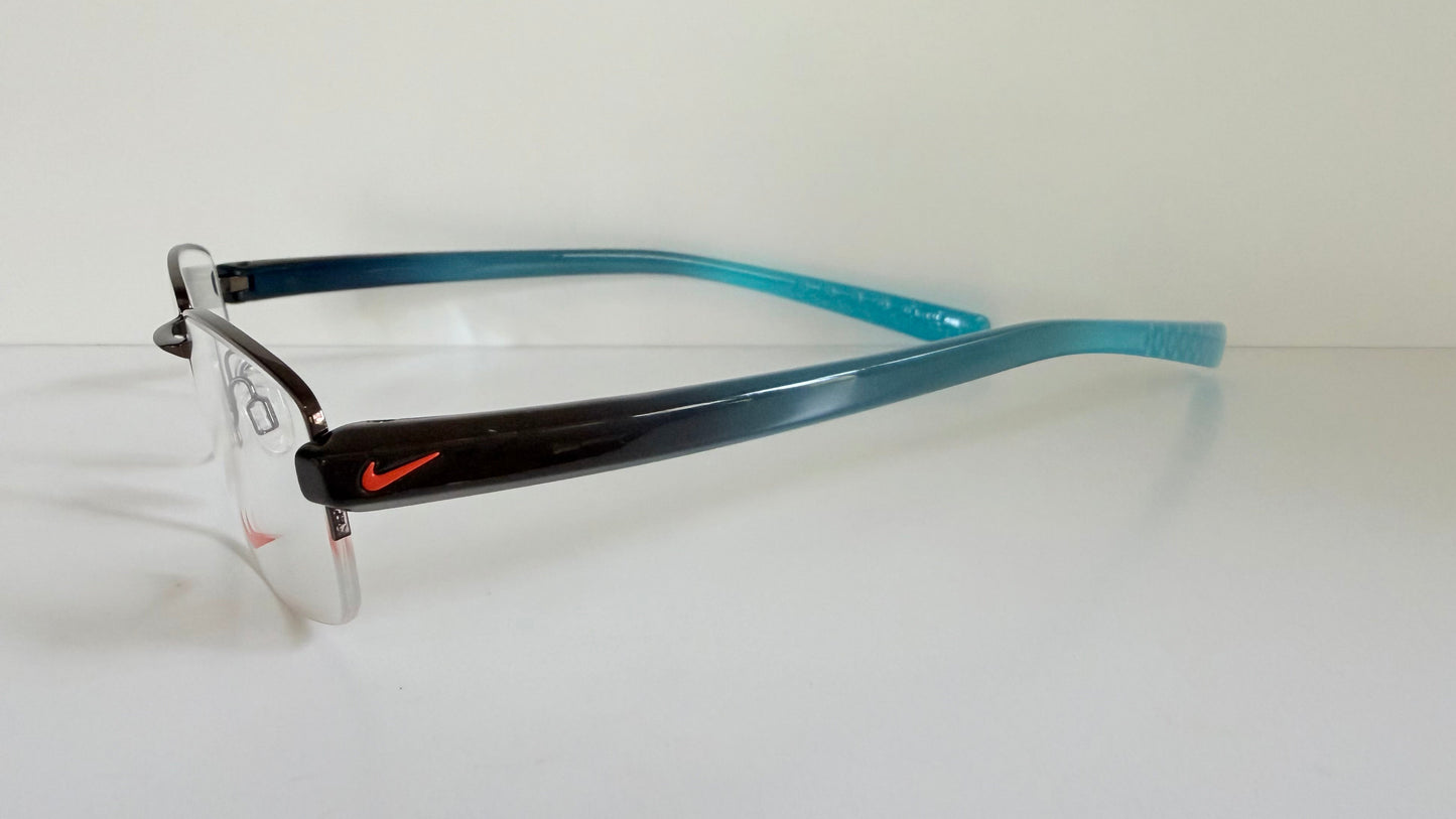 Vintage Nike 00s eyeglasses - Y2K rimless frame with black and blue temple