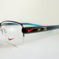 Vintage Nike 00s eyeglasses - Y2K rimless frame with black and blue temple