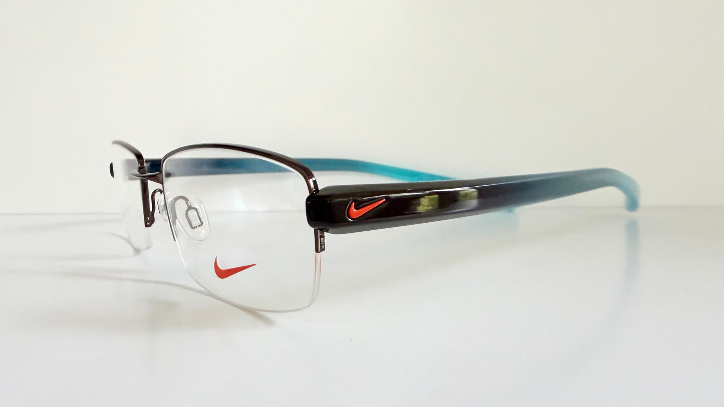 Vintage Nike 00s eyeglasses - Y2K rimless frame with black and blue temple