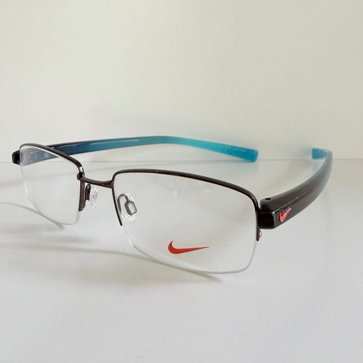 Vintage Nike 00s eyeglasses - Y2K rimless frame with black and blue temple