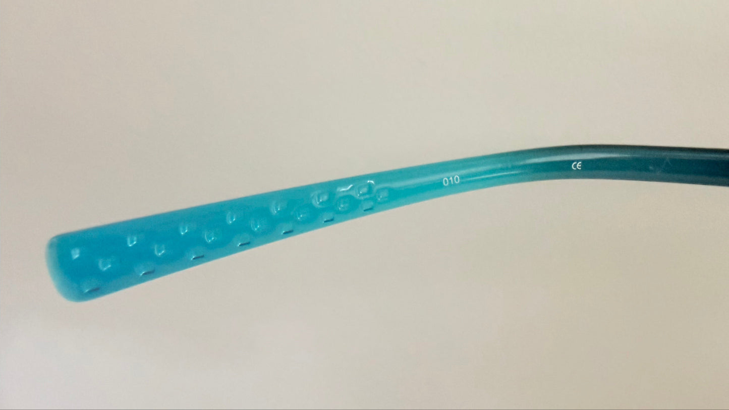 Vintage Nike 00s eyeglasses - Y2K rimless frame with black and blue temple