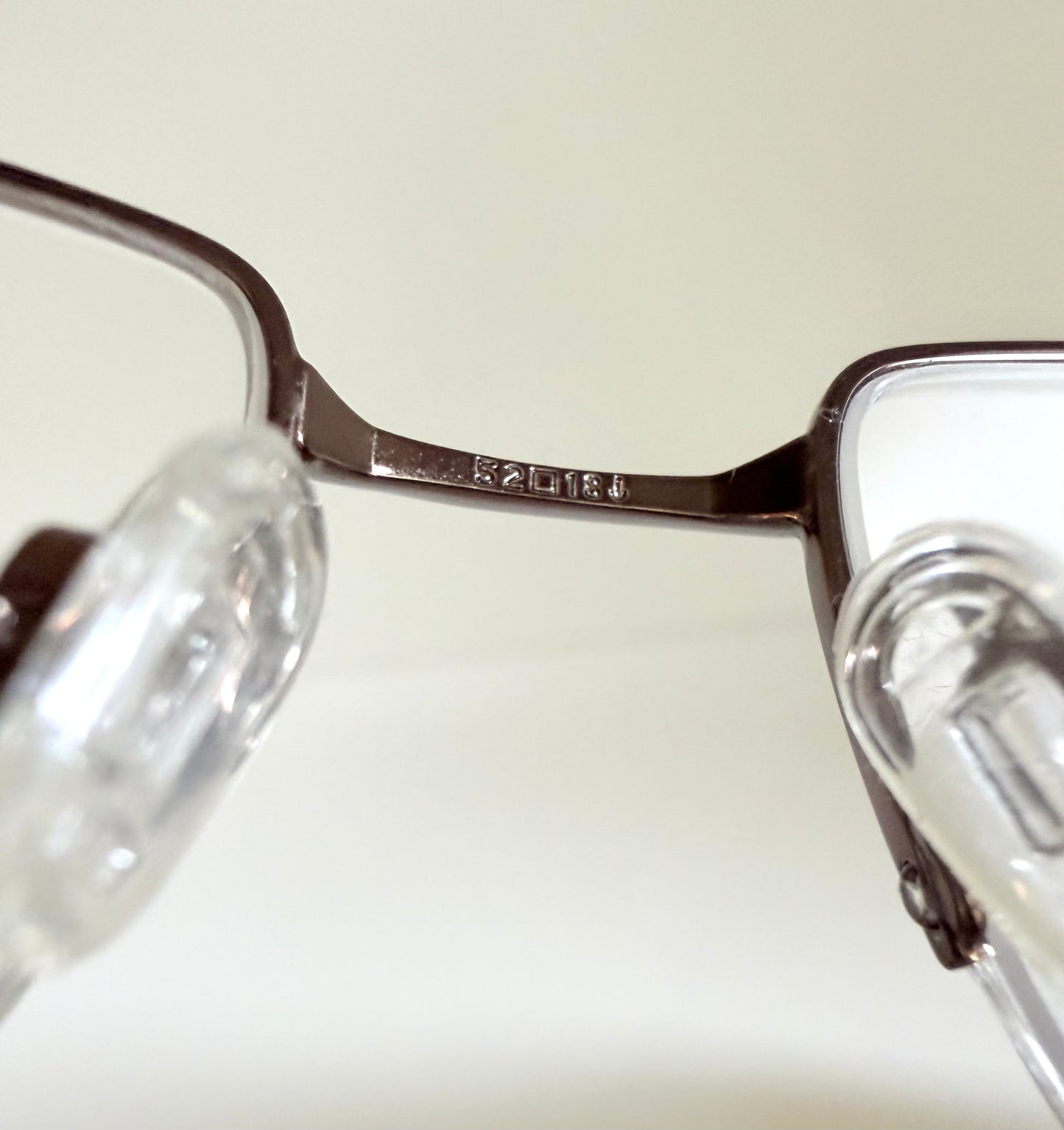 Vintage Nike 00s eyeglasses - Y2K rimless frame with black and blue temple
