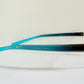 Vintage Nike 00s eyeglasses - Y2K rimless frame with black and blue temple
