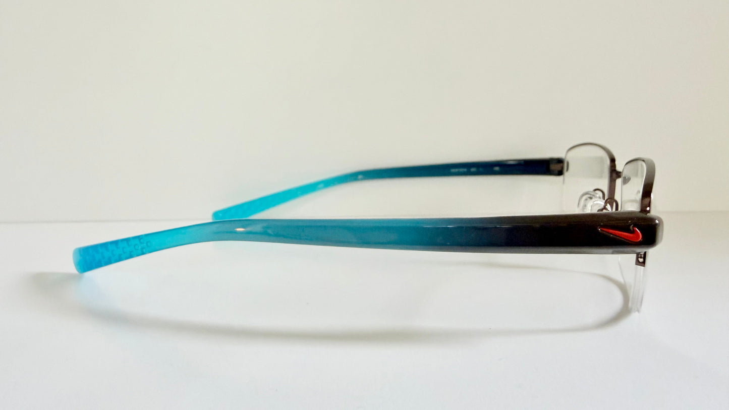 Vintage Nike 00s eyeglasses - Y2K rimless frame with black and blue temple