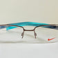 Vintage Nike 00s eyeglasses - Y2K rimless frame with black and blue temple