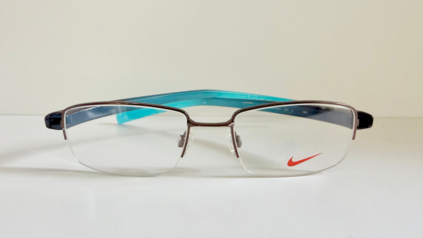 Vintage Nike 00s eyeglasses - Y2K rimless frame with black and blue temple