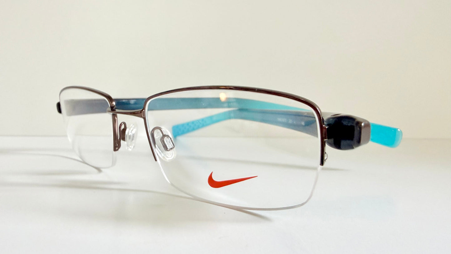 Vintage Nike 00s eyeglasses - Y2K rimless frame with black and blue temple