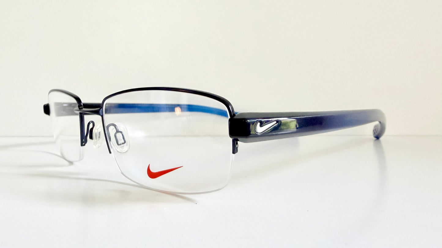 Vintage Nike 00s eyeglasses - Y2K rimless frame with black and blue temple