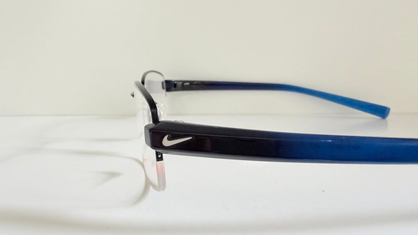 Vintage Nike 00s eyeglasses - Y2K rimless frame with black and blue temple
